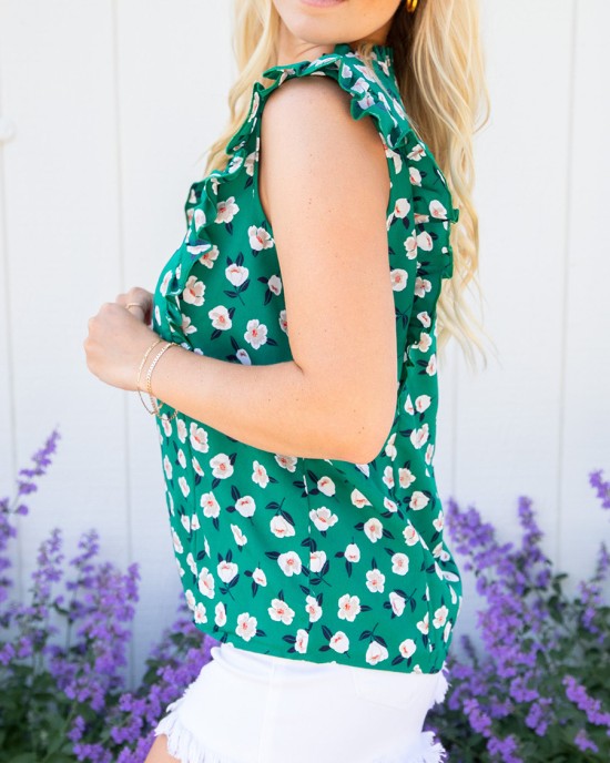 Green floral ruffled short sleeved shirt