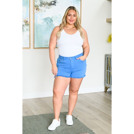 Celeste Mid Rise Shield Pocket Cutoff Shorts in Sky Blue Celeste Mid Rise Shield Pocket Cutoff Shorts in Sky Blue