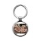 pink edged Hawaiian flowers in a m Circle Keychain